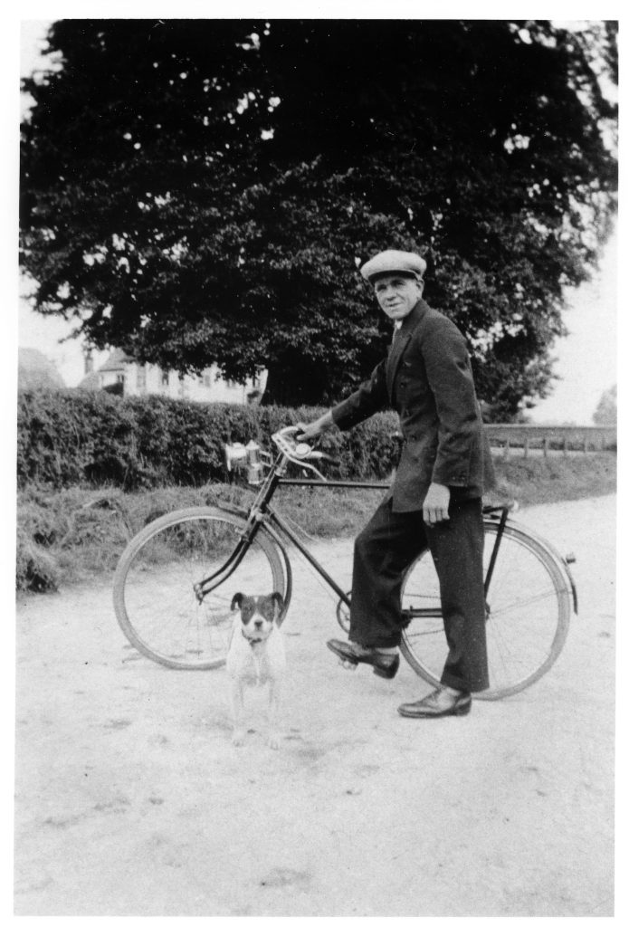 1934. Den Rumming proud of his bicycle with the acetylene gas lamp. Taken by the pond.