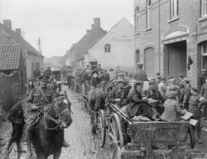 20th October 1918. Belgian refugees being taken away from the front line by the Army Service Corps after Courtrai was entered by the British 36th Division on 15th October.