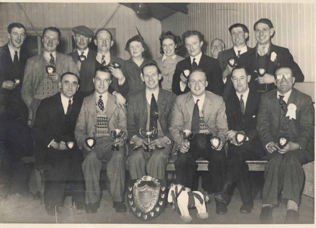 CB Darts Team 1950. Henry Goodenough standing fourth from right. Alan Lewis and Les Smith seated fourth and fifth from left.