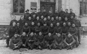 1941. German Prison of War Camp. Bill Jardine is 5th from left, 3rd row down. He married adopted daughter of Bill and Ellie Derham, lived many years in Manor Cottage