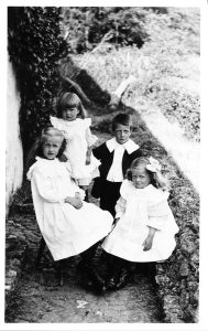 1911. Children of Jack and Mary Ann "Polly" Rumming (from left) Minnie, Alice, Bill G. and Hilda. Taken at No. 60 Compton Bassett