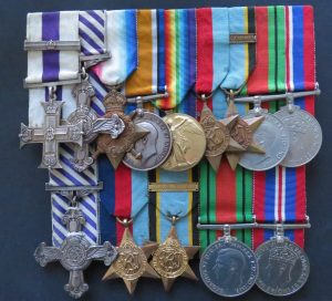 The top row of medals belong to William Fielding Johnson. From left to right: his MC and bar; second is his DFC; 1914-1915 Star; British War Medal 1914-1920; Allied Victory Medal 1914-1919. Bottom row contains the medals belonging to his son Hugh Fielding Johnson